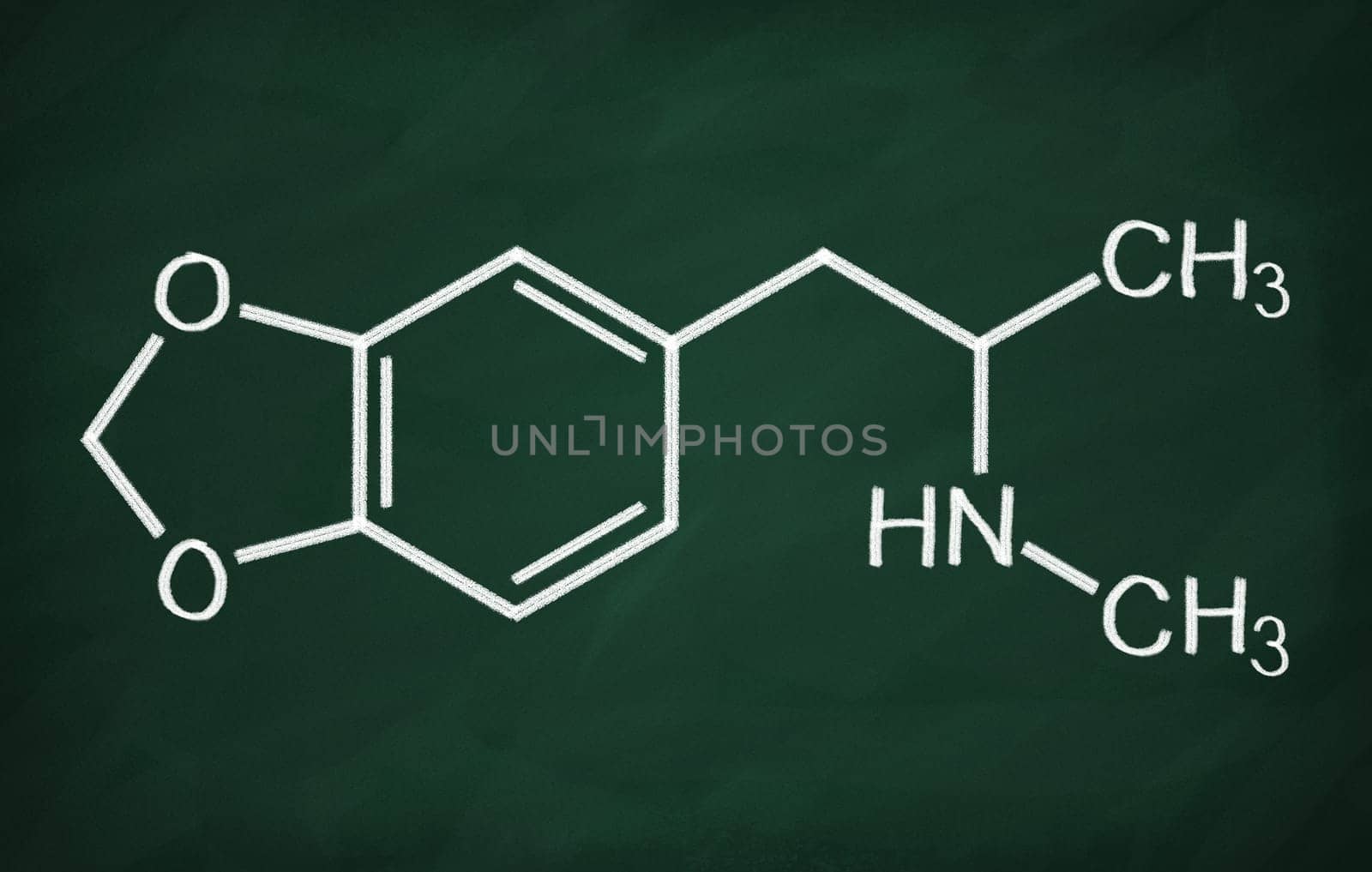 Structural model of MDMA (ecstasy) on the blackboard.