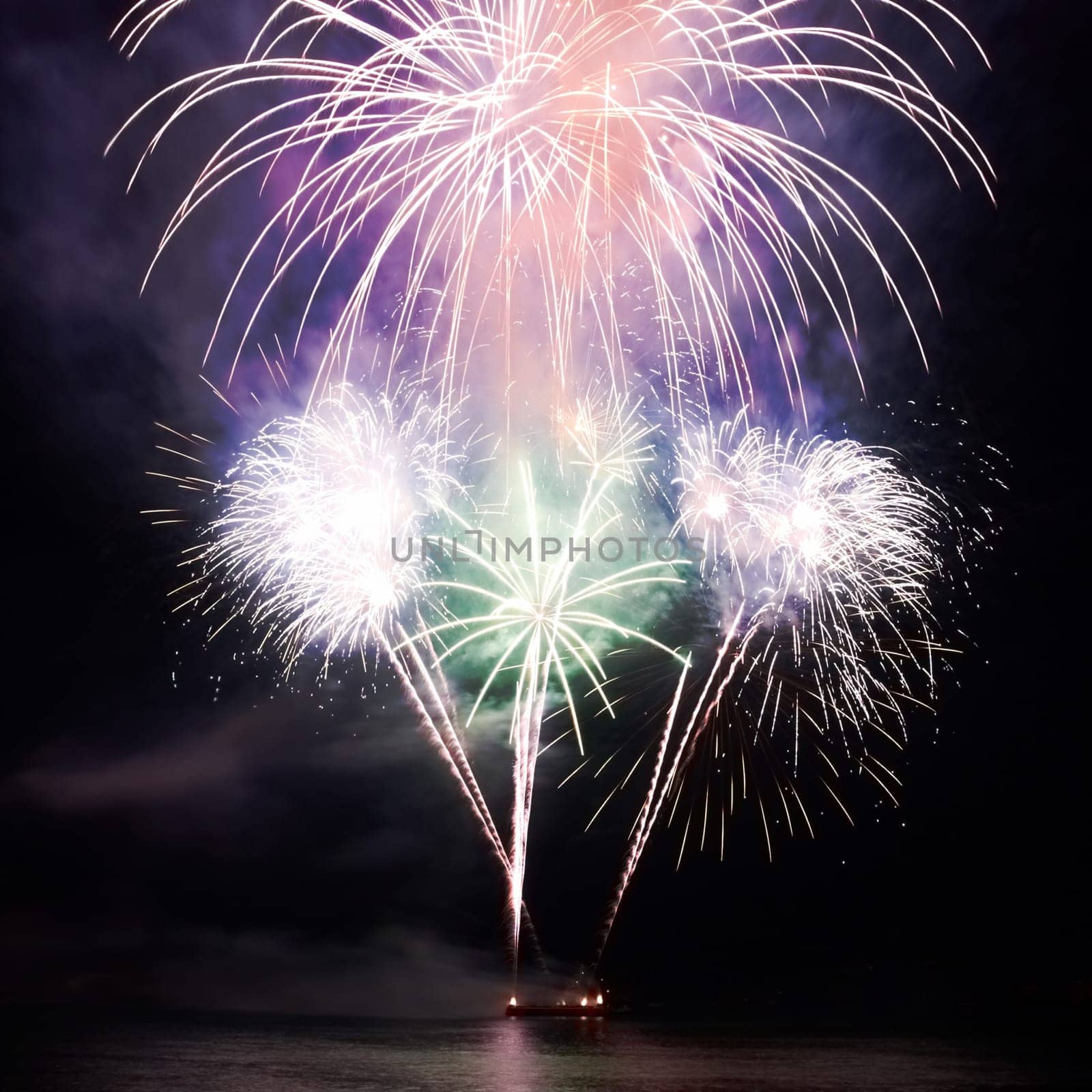 Colorful red fireworks on the black sky background