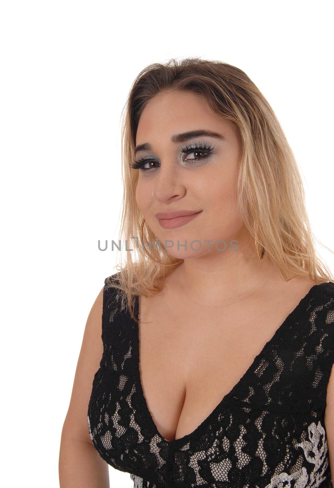 Beautiful young blond woman in a close up portrait in a black dress .smiling, isolated for white background.