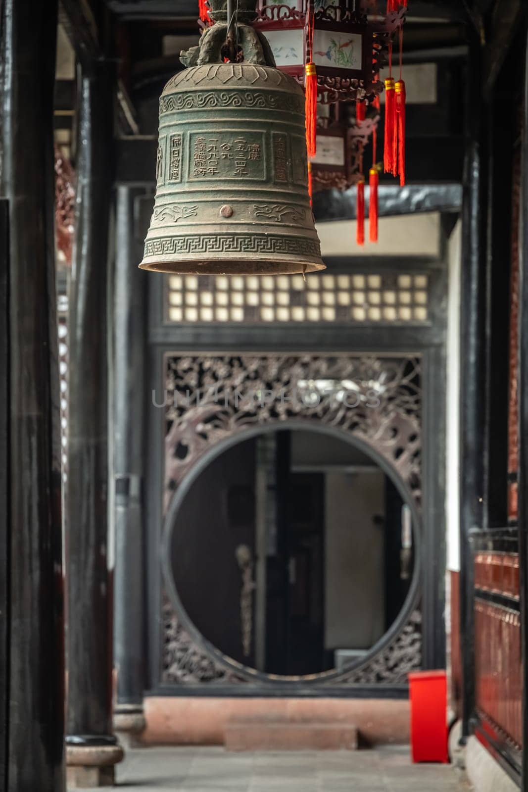 Large Brass Bell hanging under the roof in Wenshu Monastery, Chengdu, China