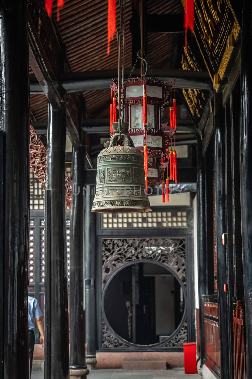 Large Brass Bell hanging under the roof in Wenshu Monastery, Chengdu, China