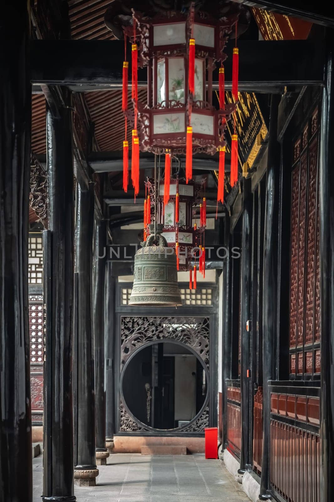 Large Brass Bell hanging under the roof in Wenshu Monastery, Chengdu, China