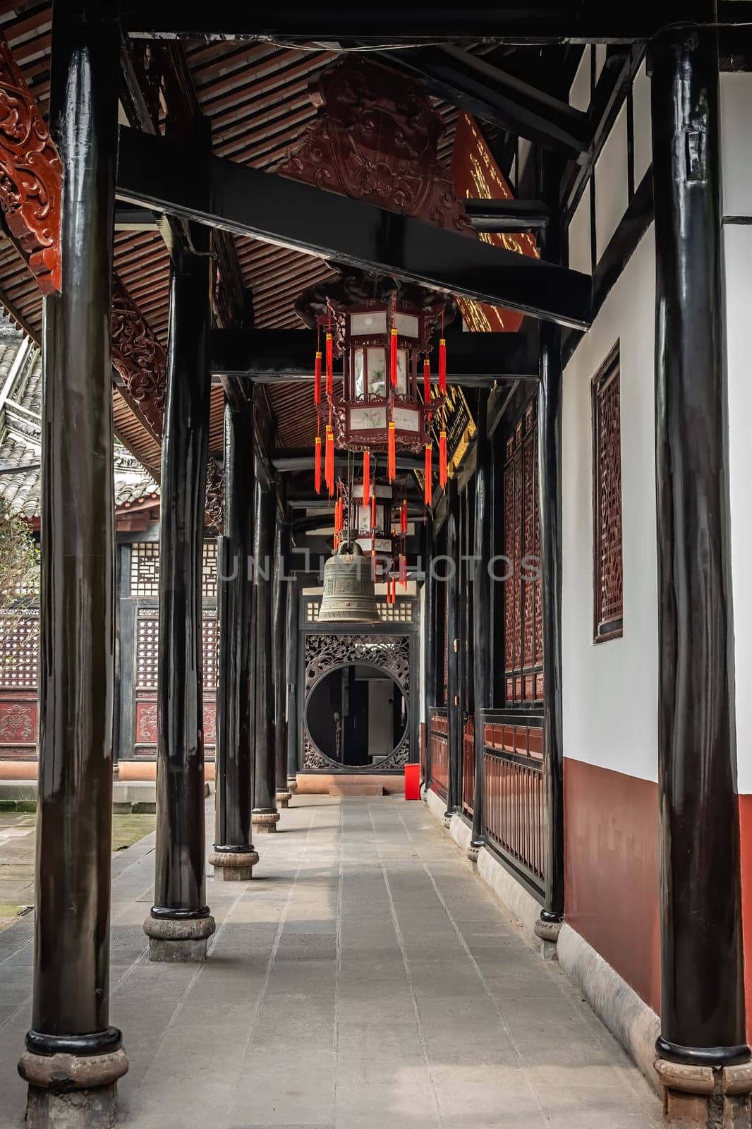 Large Brass Bell hanging under the roof in Wenshu Monastery, Chengdu, China