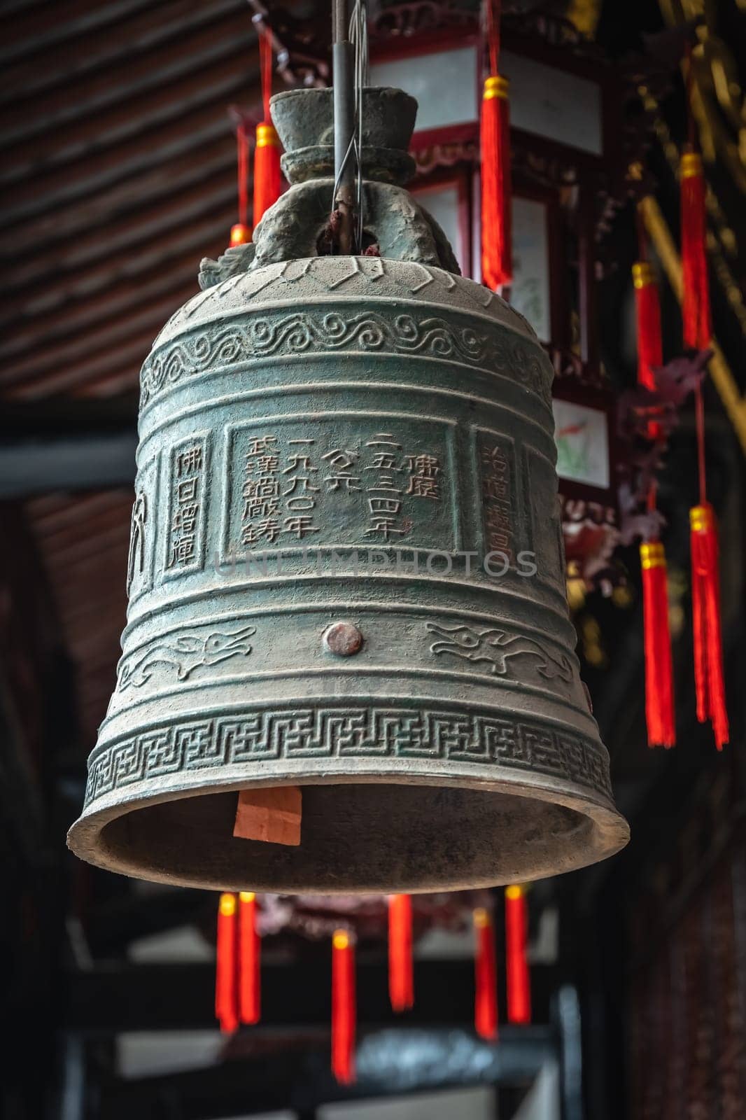 Large Brass Bell hanging under the roof in Wenshu Monastery, Chengdu, China