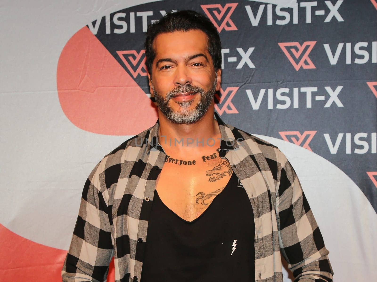 actor and model Aurelio Savina at the erotic fair Venus 2019 in Berlin
