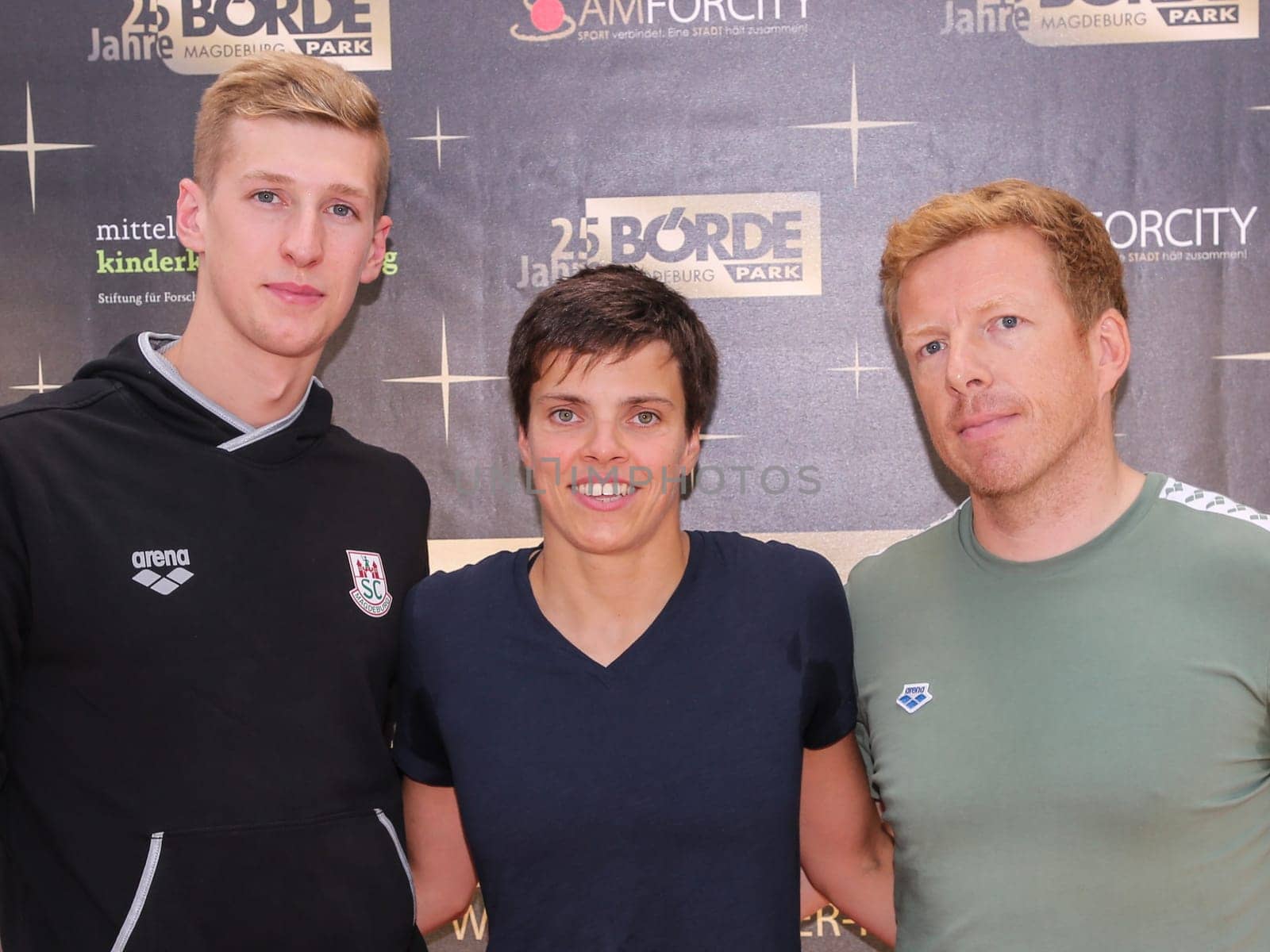 German Swimmer Florian Wellbrock and german swimmer Franziska Hentke and Coach Bernd Beckhahn  ( SC Magdeburg , DSV ) in the action "Pictures of Hope"" in Magdeburg"