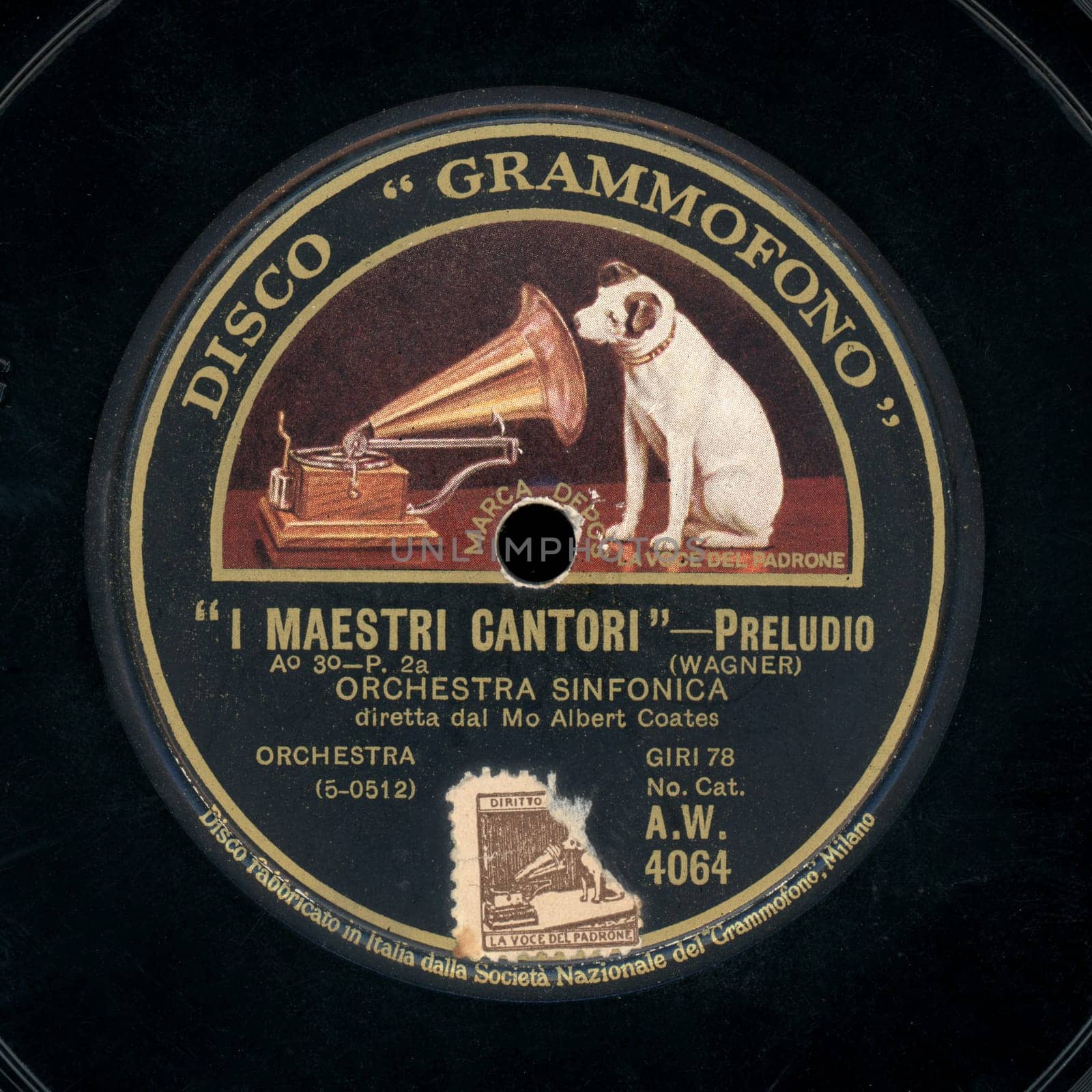 MILAN, ITALY - CIRCA DECEMBER 2019: Vintage 78 rpm shellac disc of La Voce del Padrone (translation:  His Master's Voice) record label