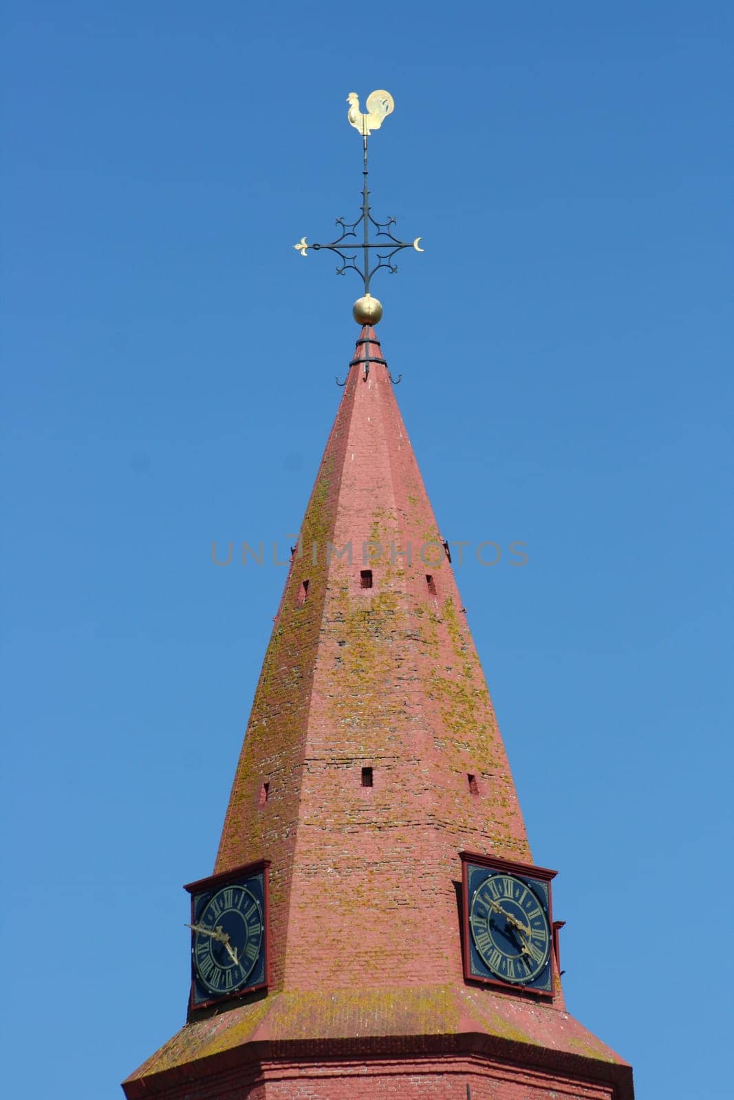 Red Tower with blue sky in the background