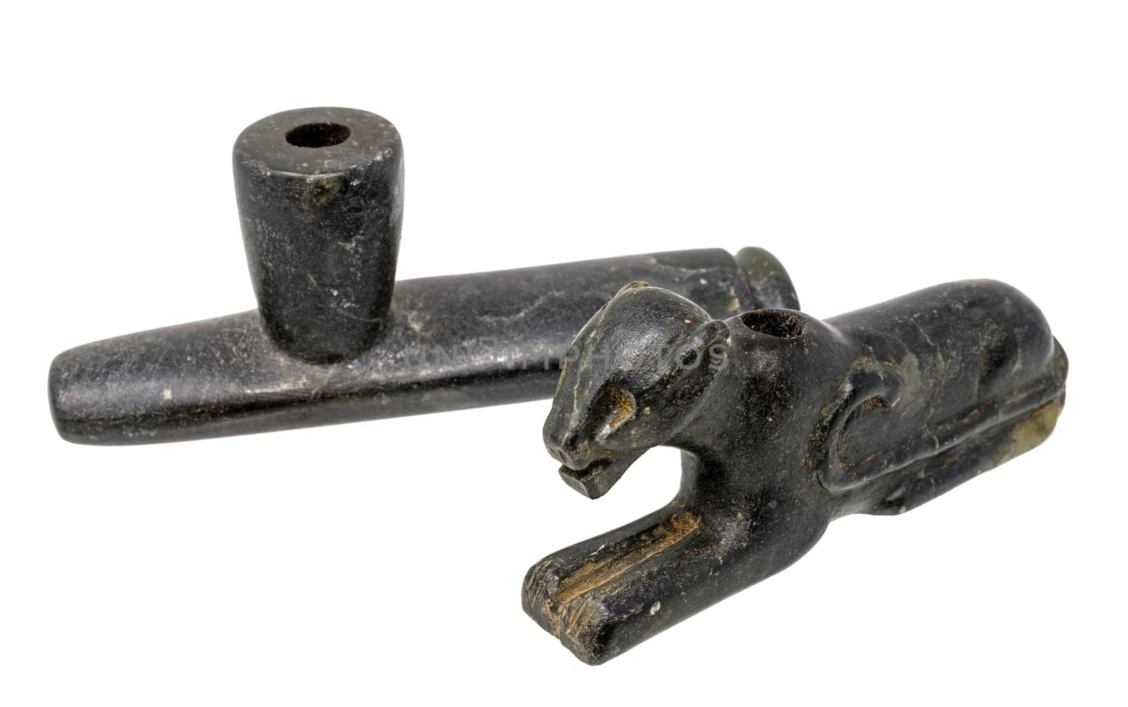 Two Pipes of the North American Indians made of dark soapstone isolated on white