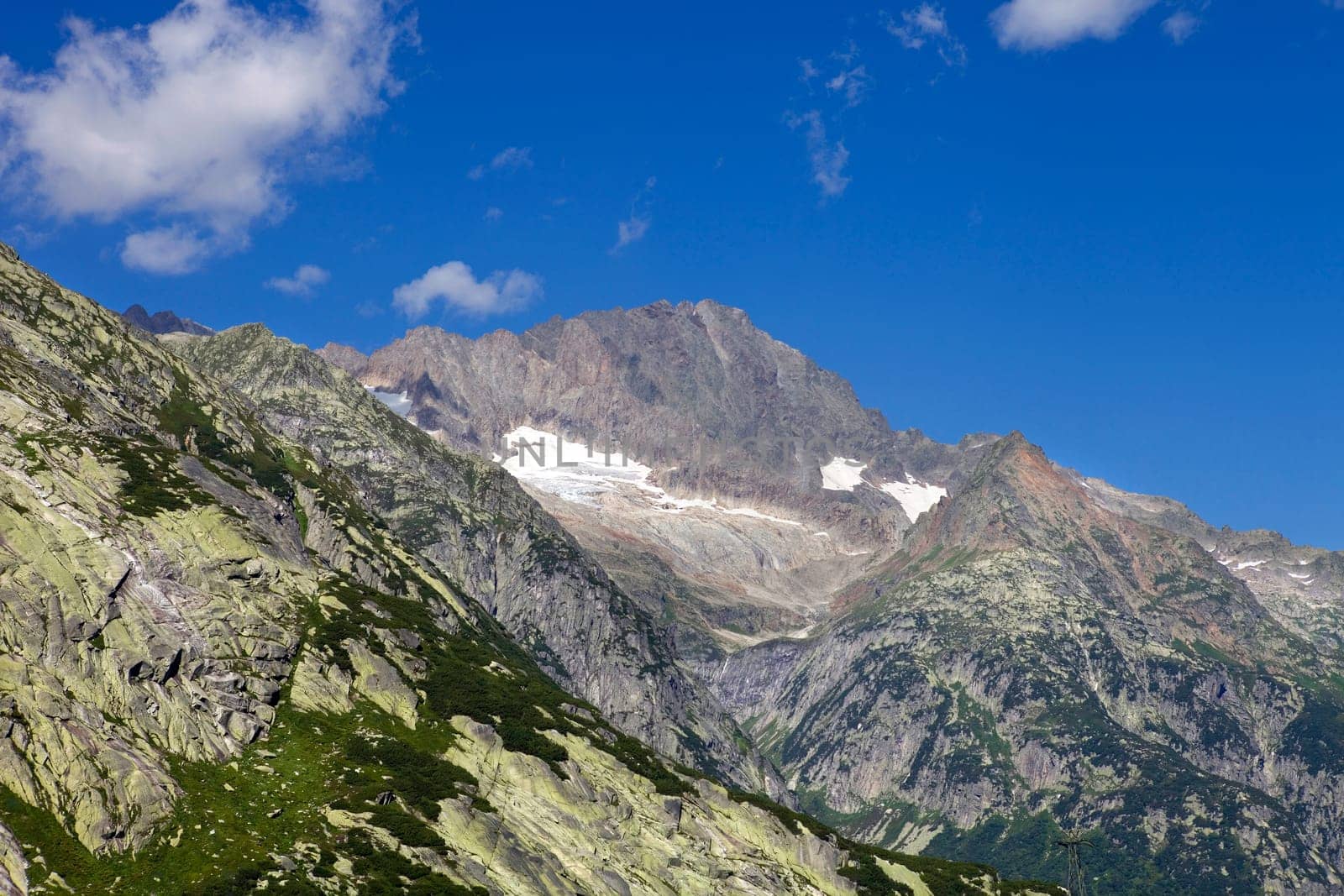 View of mountain peaks in spring time in switzerland