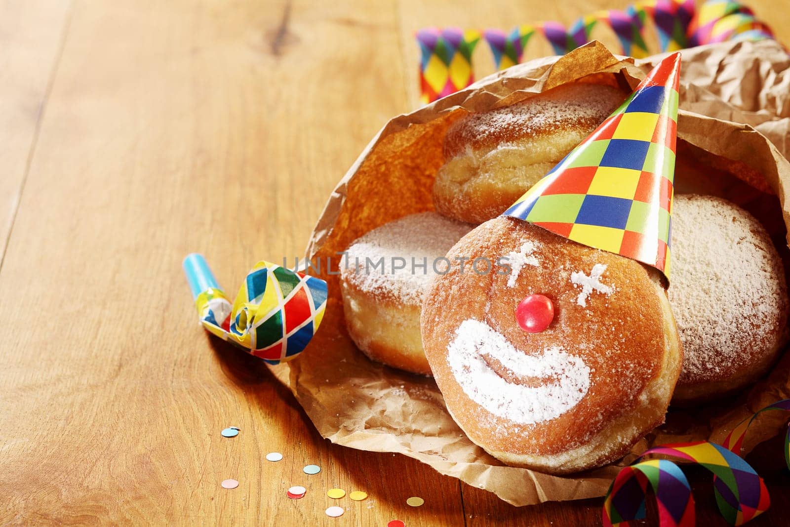 Close up Gourmet Carnival Powdered Sugar Raised Donuts on Paper, Placed on Wooden Table.