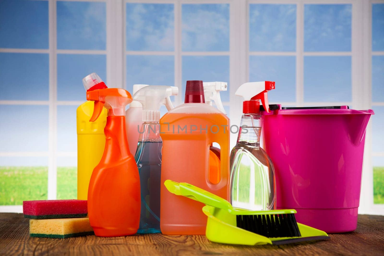 House cleaning product on wood table and window background