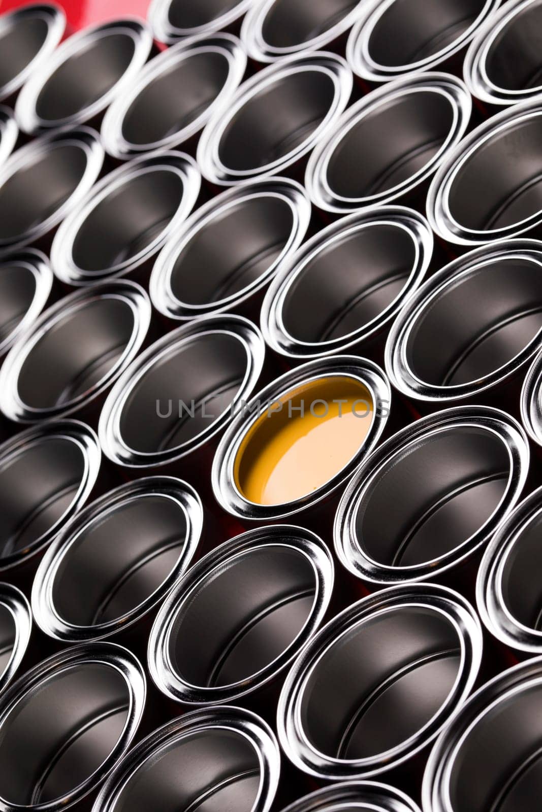 reativity concept group of tin metal cans with color paint