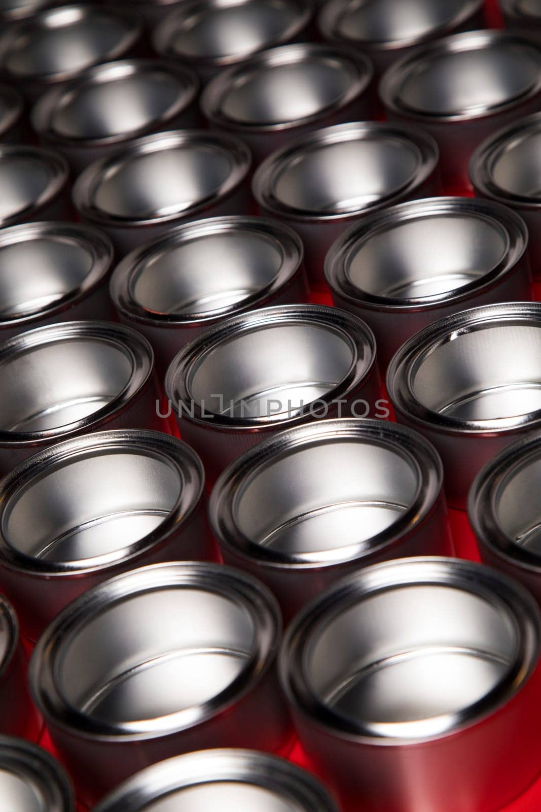Group of tin metal cans with color paint