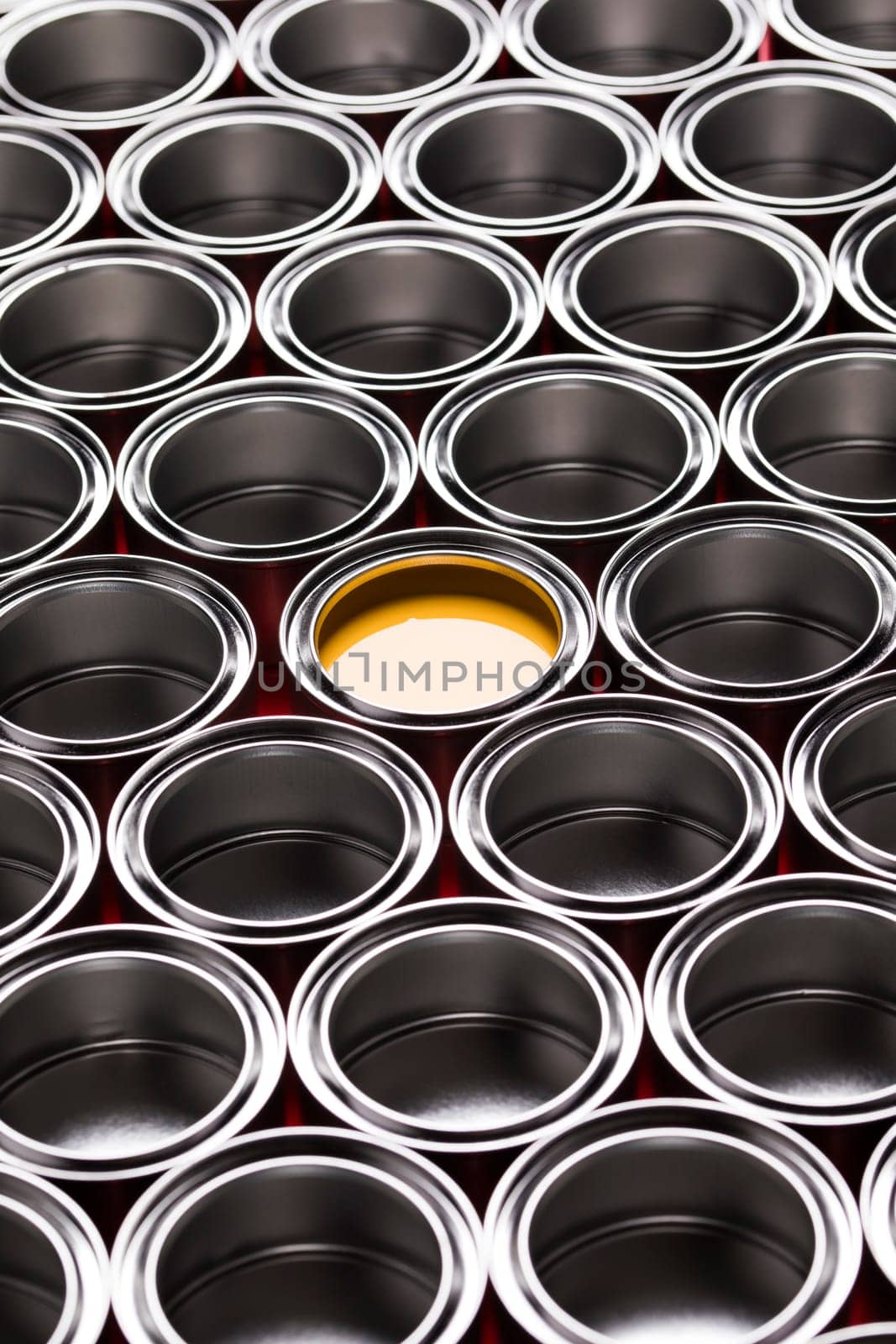 reativity concept group of tin metal cans with color paint