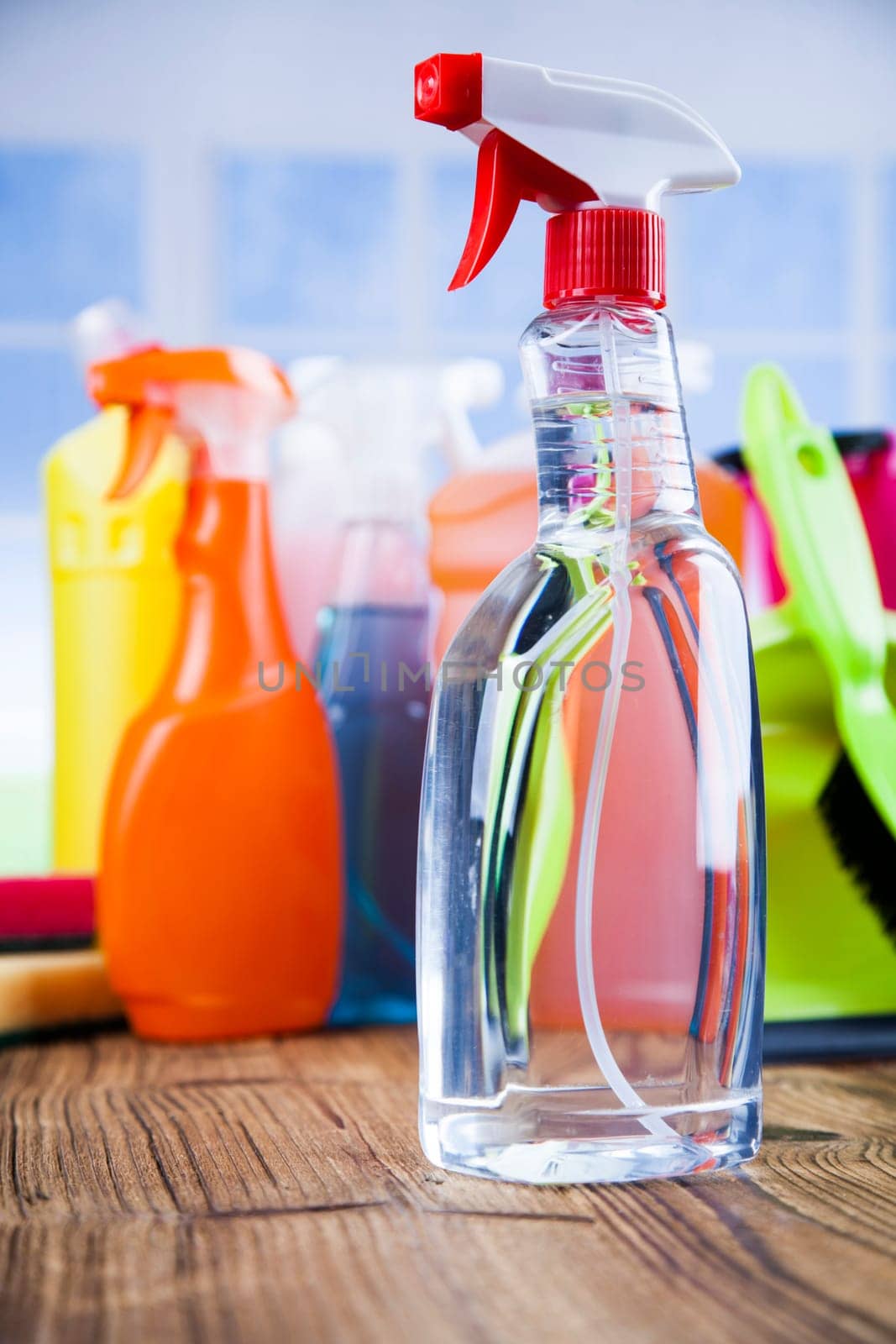 House cleaning product on wood table and window background