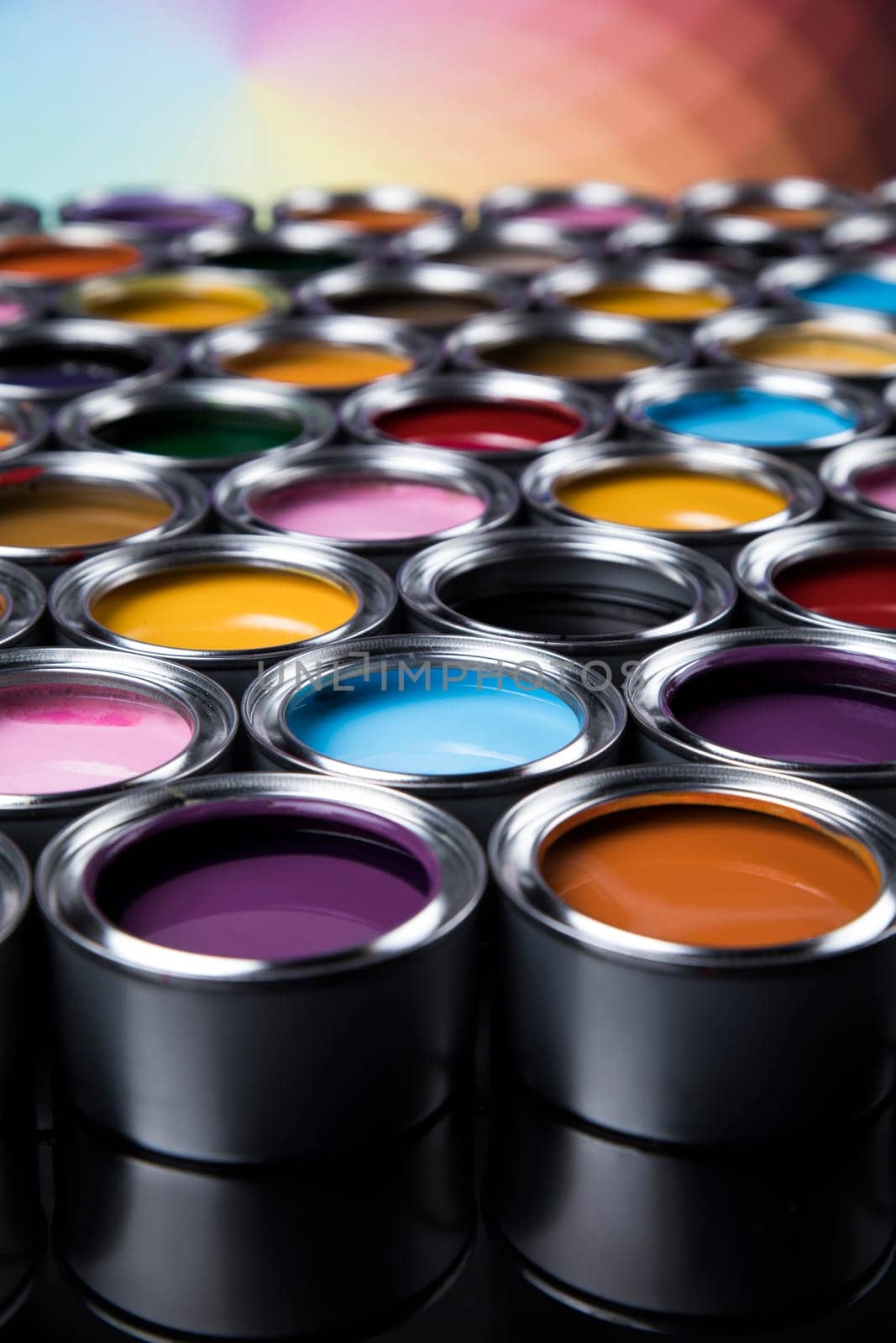 Group of tin metal cans with color paint