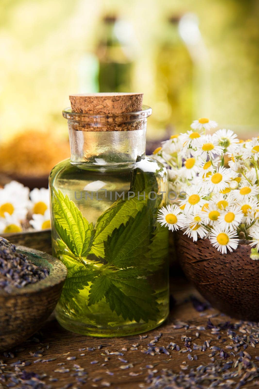 Oil and Natural medicine, wooden table background