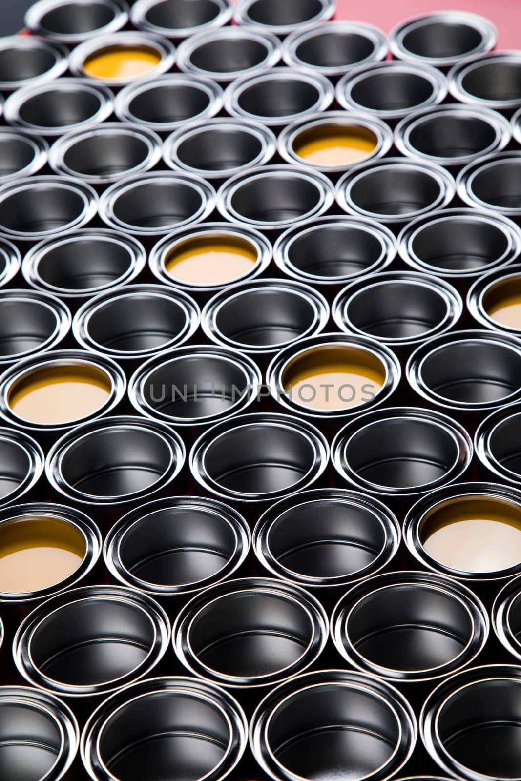 Group of tin metal cans with color paint