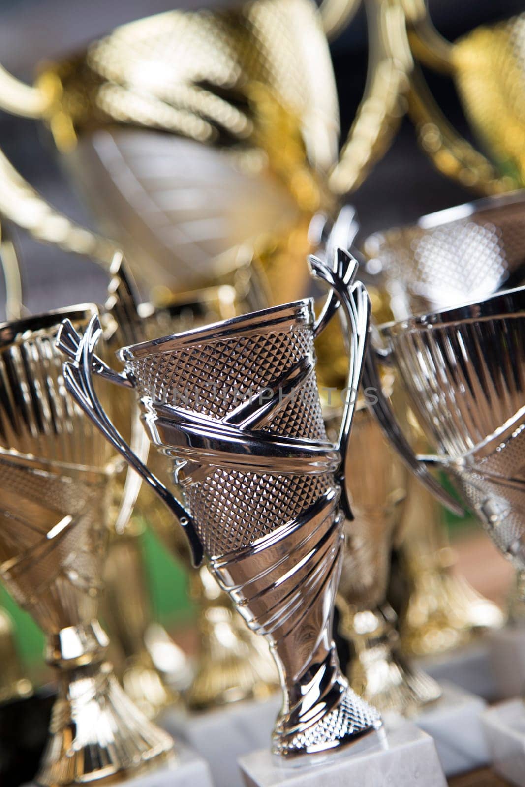 Winning trophy championship award, sport stadium background