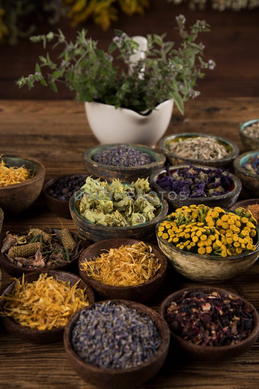 Natural remedy and wooden table background
