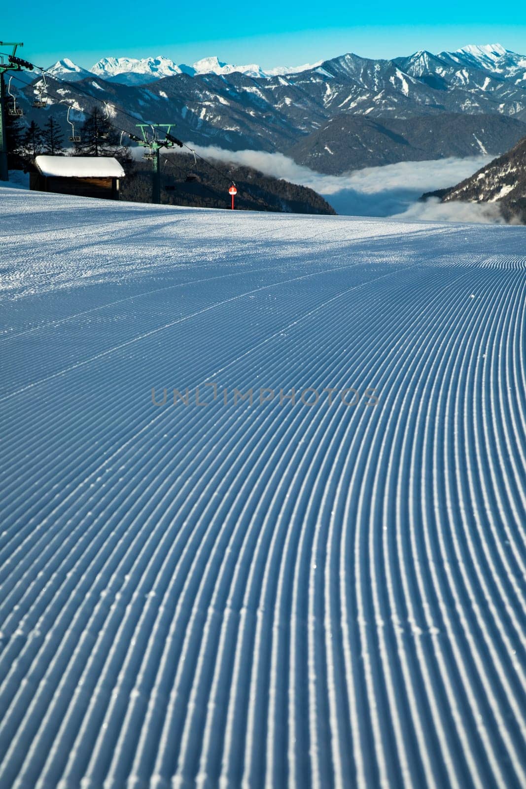 Winter mountains panorama with ski slope