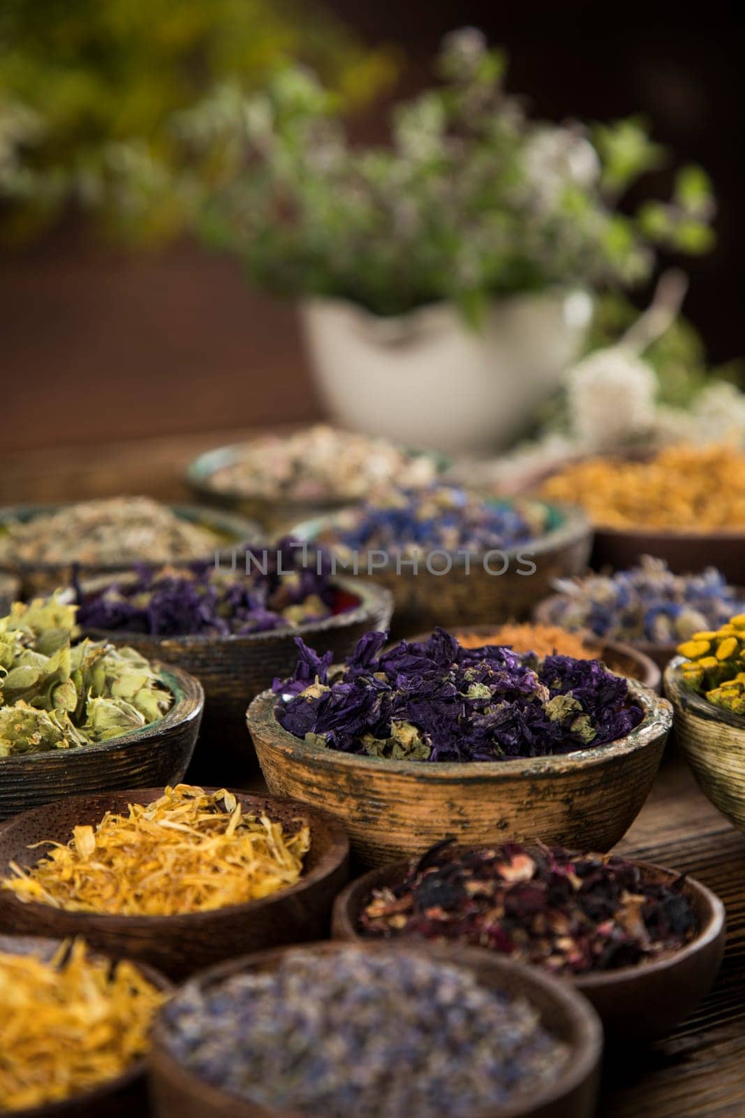 Natural remedy and wooden table background