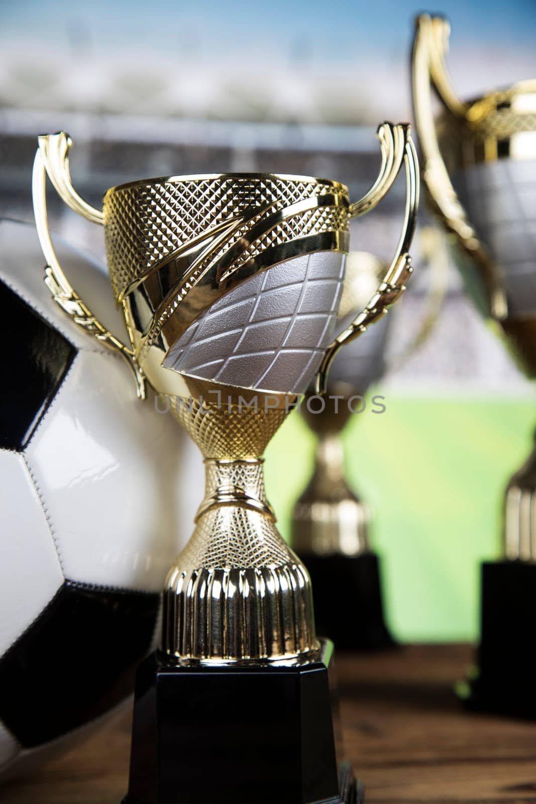 Trophy cup and sport ball background