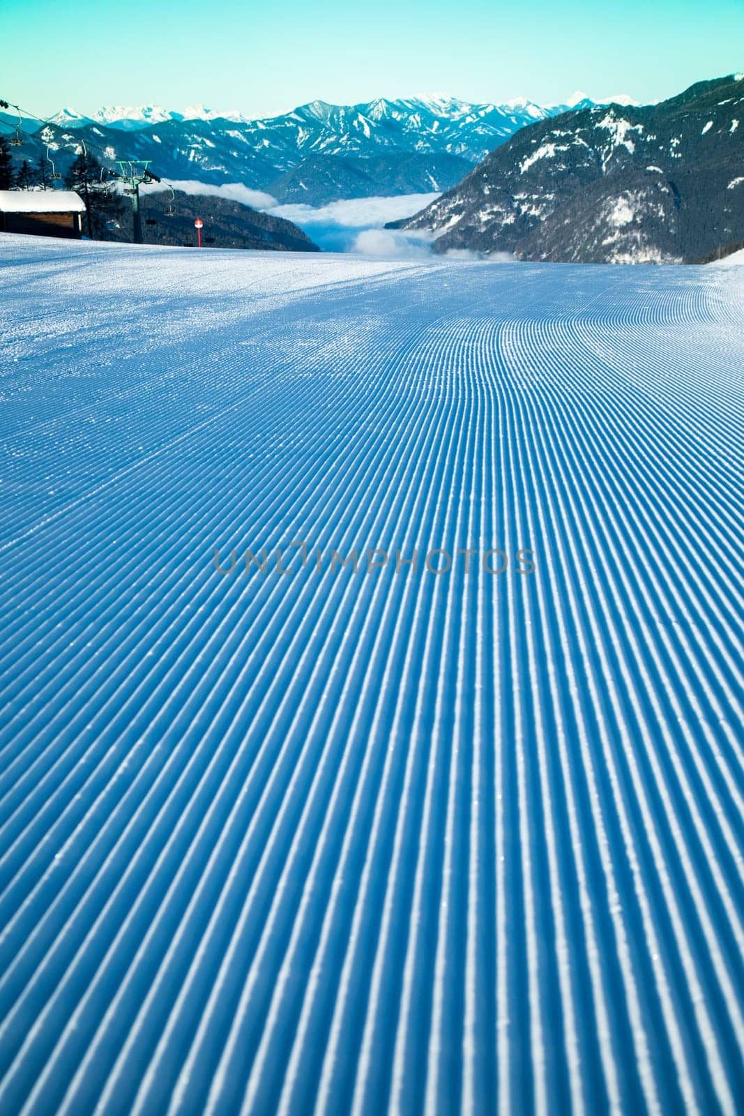 Winter mountains panorama with ski slope