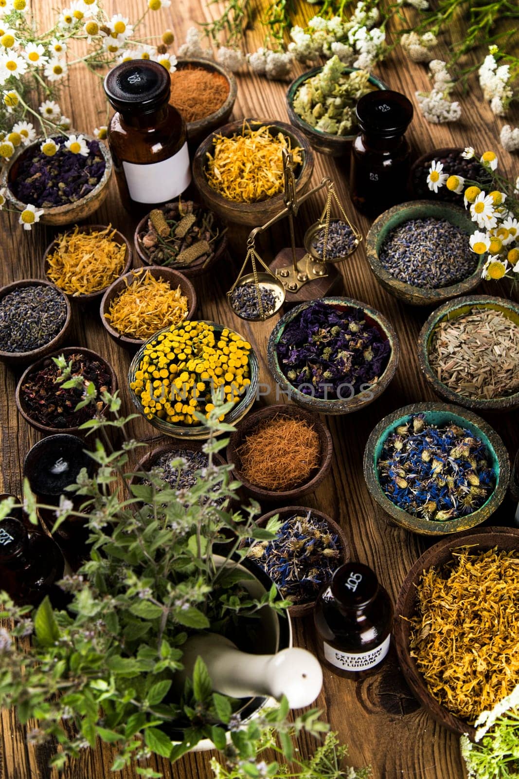 Natural remedy and wooden table background