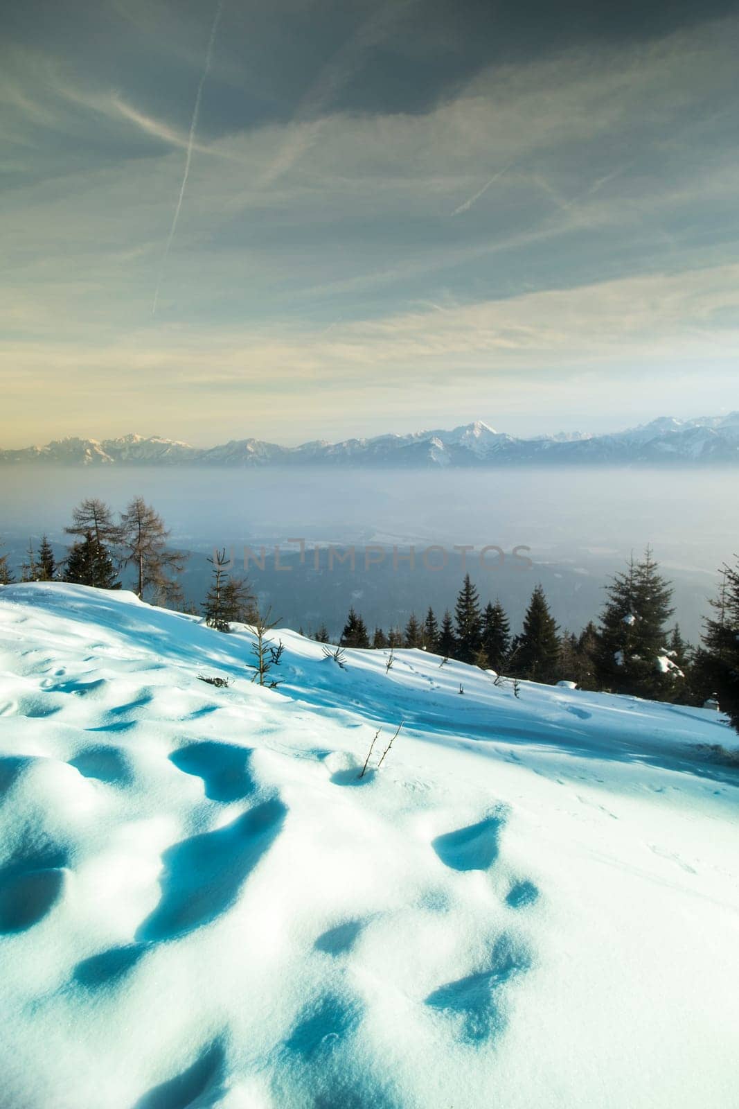 Fantastic winter landscape, sunset, snow covered trees