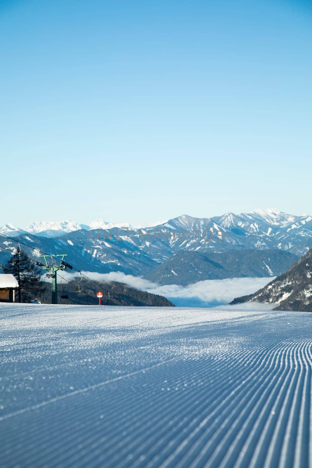 Winter mountains panorama with ski slope