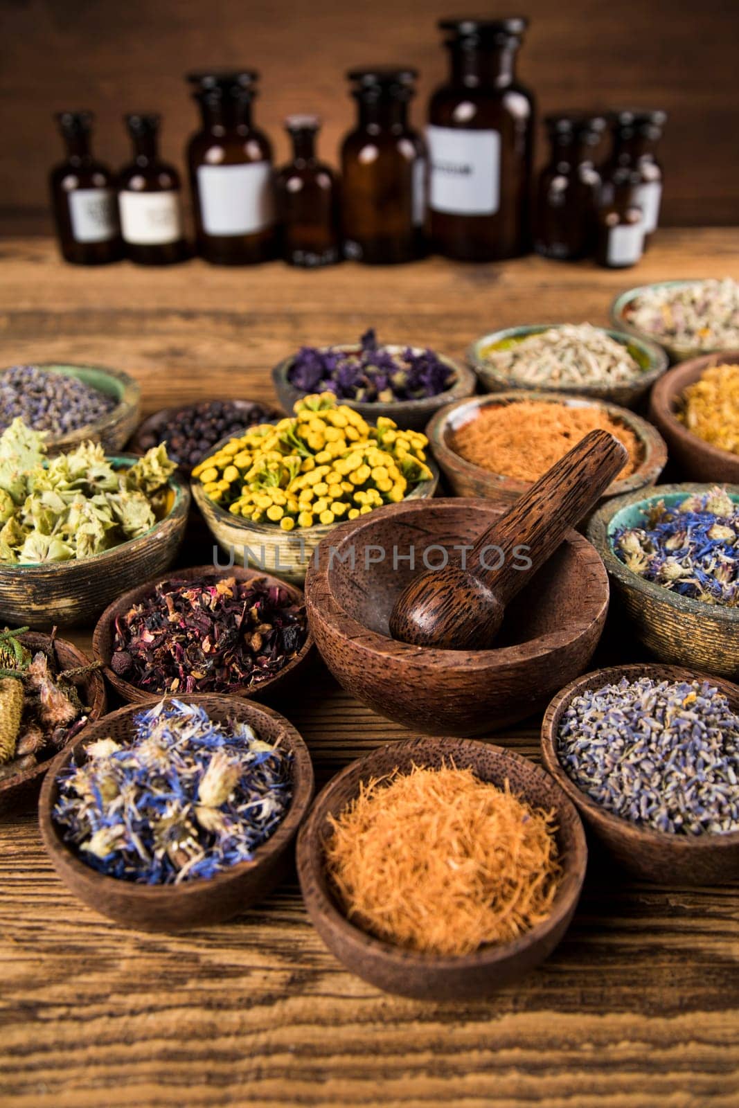 Alternative medicine, dried herbs background