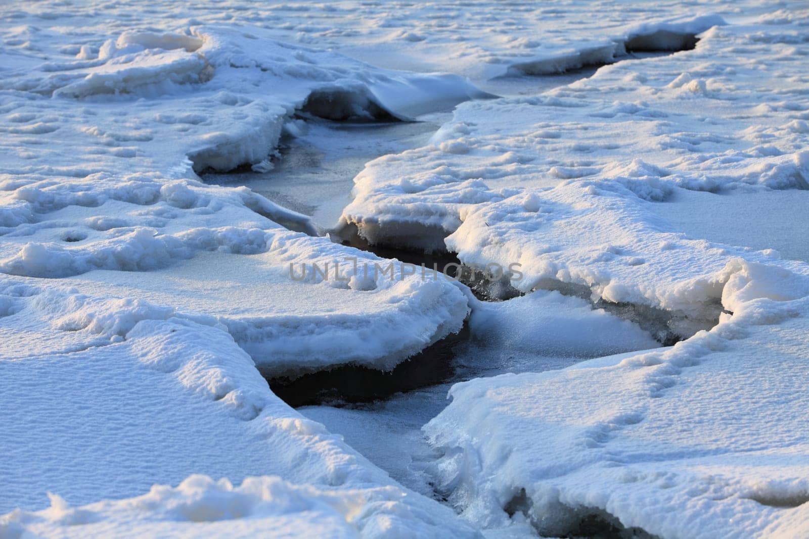 winter, crack on the ice of the lake