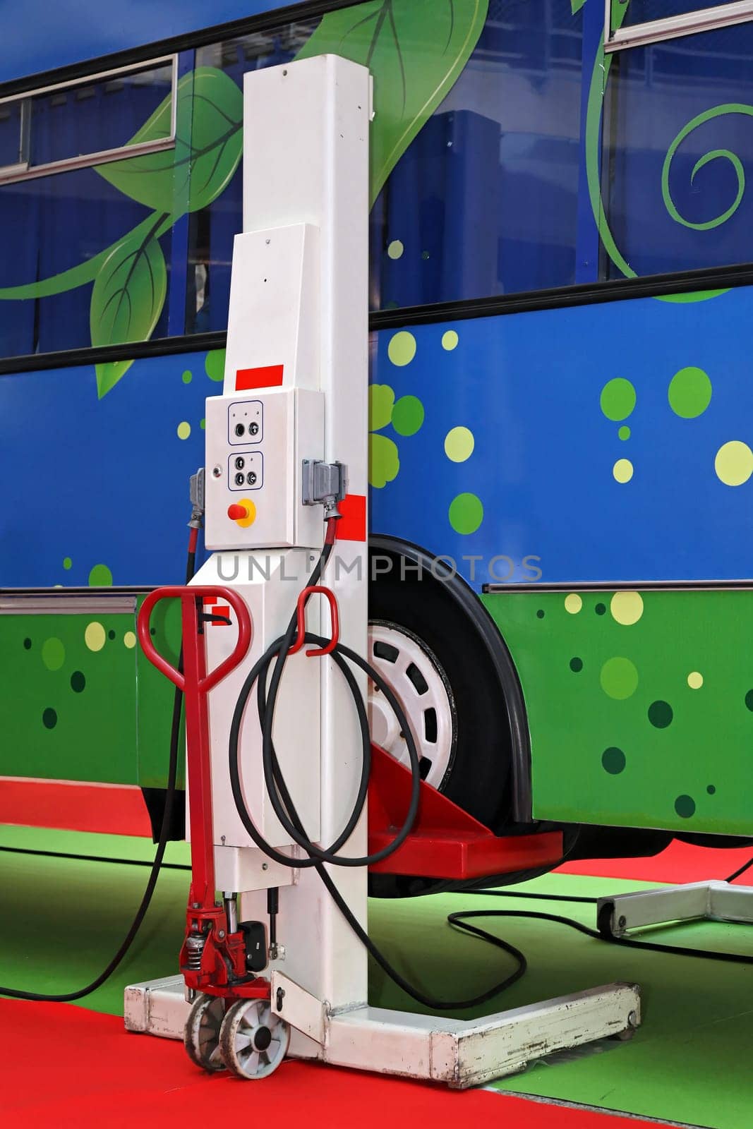 Bus at elevated platform in garage service