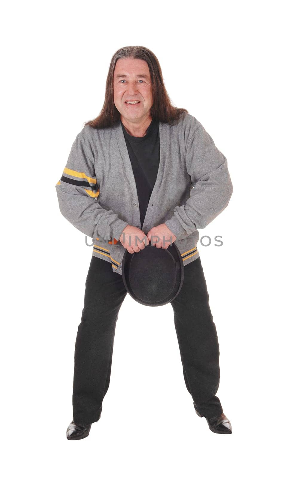 An indigenous man in a gray jacket and long brunette hair dancing.his black hat, isolated for white background.
