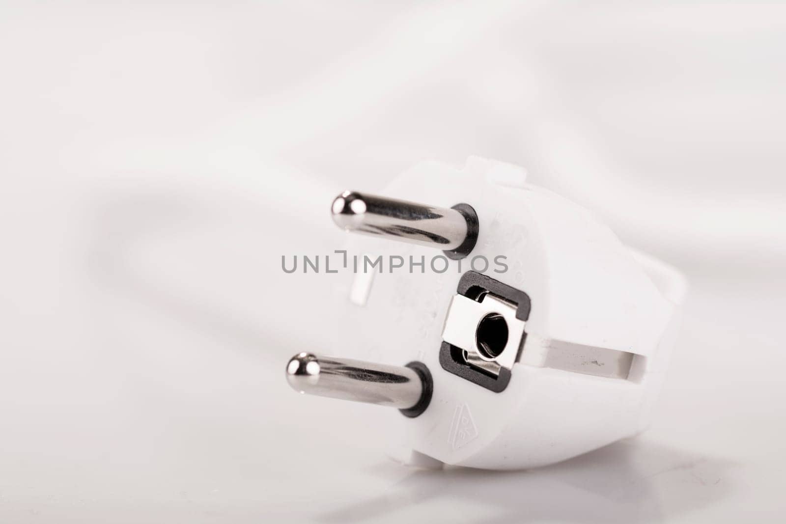 electric plug in closeup - Symbol foto