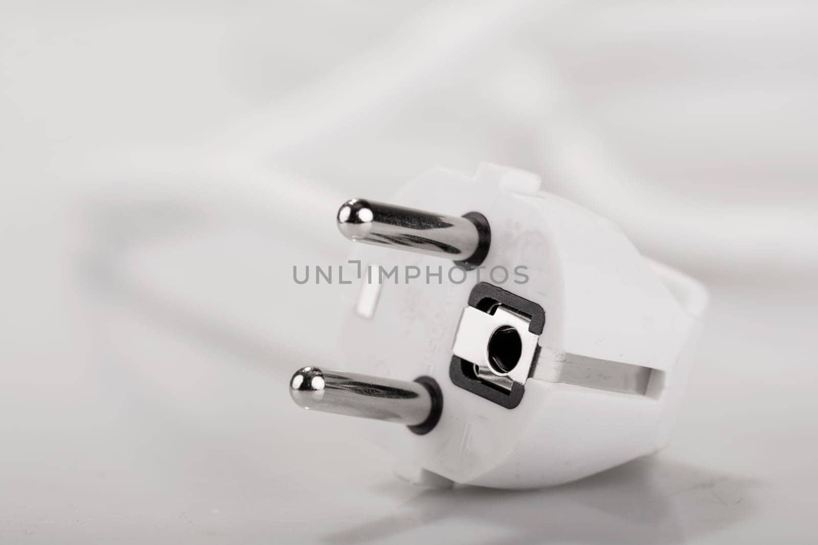 electric plug in closeup - Symbol foto