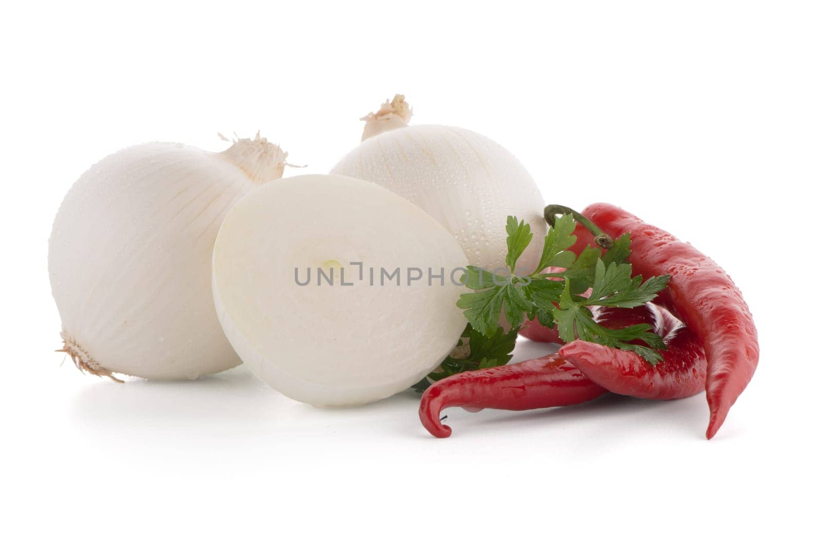 Mediterranean vegetables with red chilli peppers, parsley and bell peppers isolated on white background.