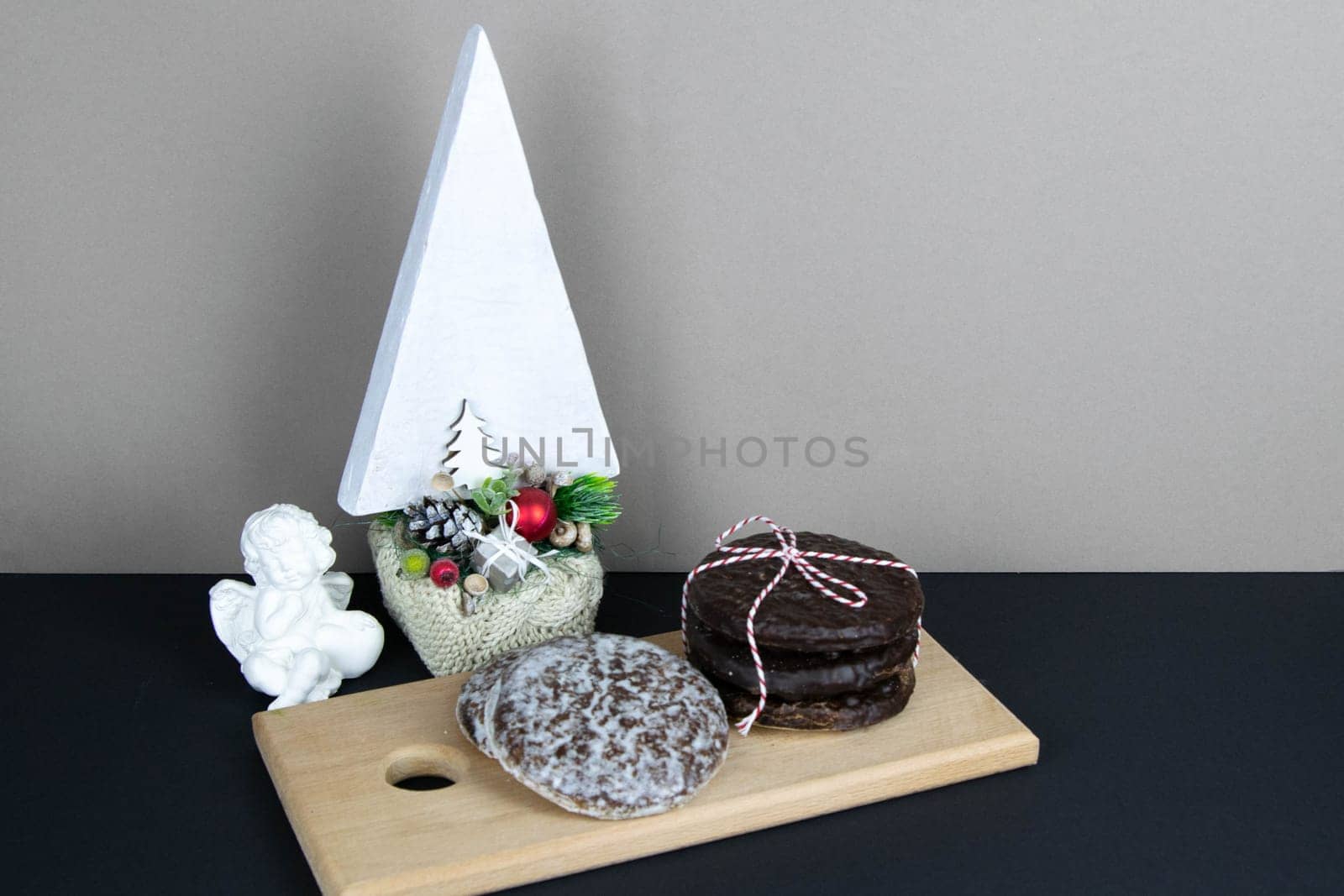 Pieces of cutted thin Armenian pita bread or lavash wrapped tomatoes, cottage cheese or curd, chicken meat, tomatoes and herbs - dill, onion, parsley with vintage knife on cutting board.