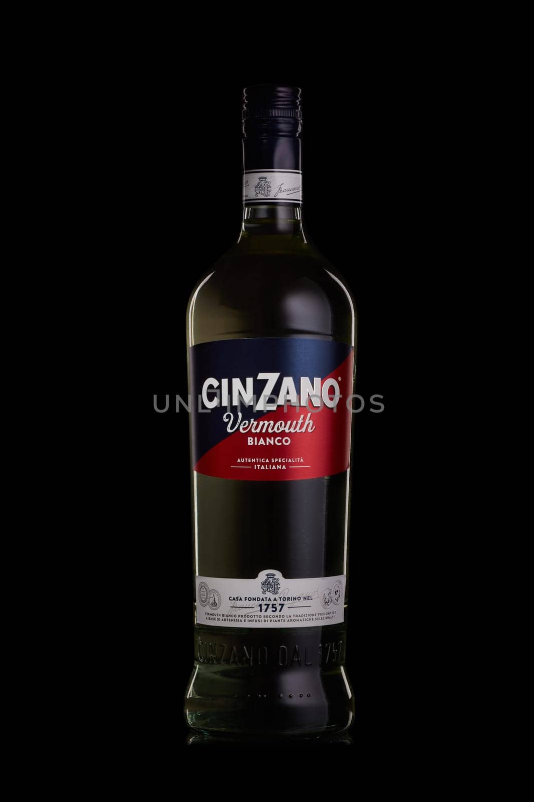 St.Petersburg, Russia - December 2019 -  Bottle of Italian vermouth Cinzano Bianco on black background. Authentic Italian tradition