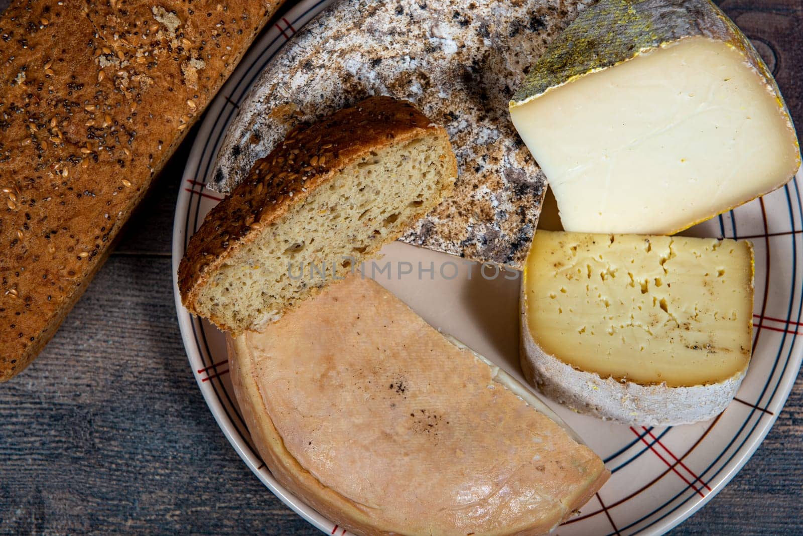 cheeses and Tomme de Savoie, French cheese Savoy,a french Alps France.