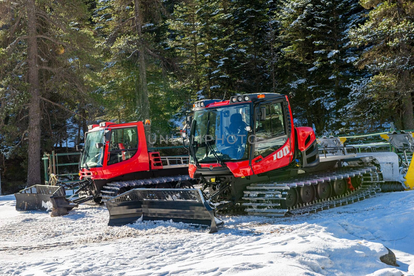 a view of two snow groomer