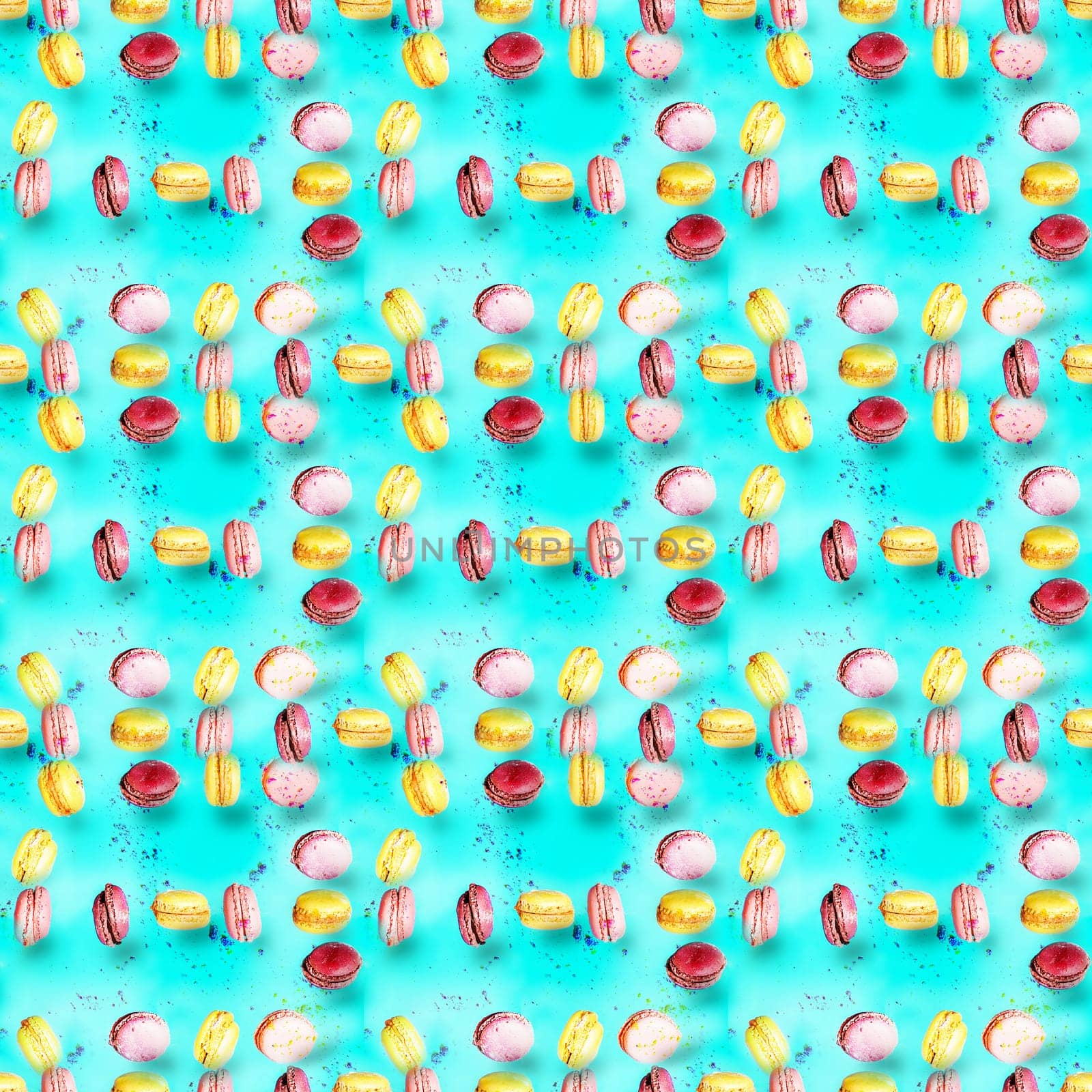 Abstract seamless pattern with flying colored macaroons, holiday concept