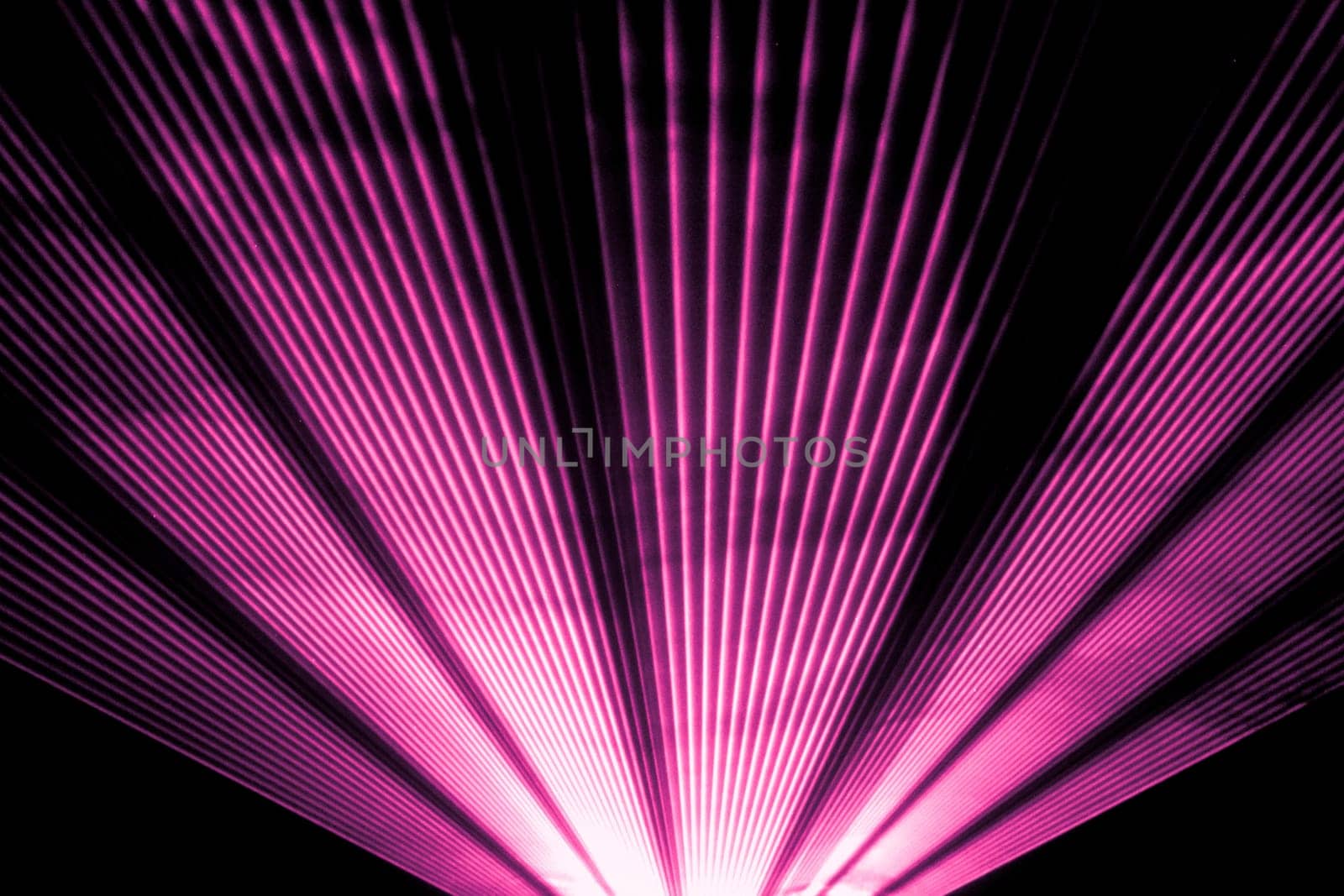 Luxury entertainment in nightclub event, festival, concert or New Years Eve. Ray beams are symbol for science and universe research.