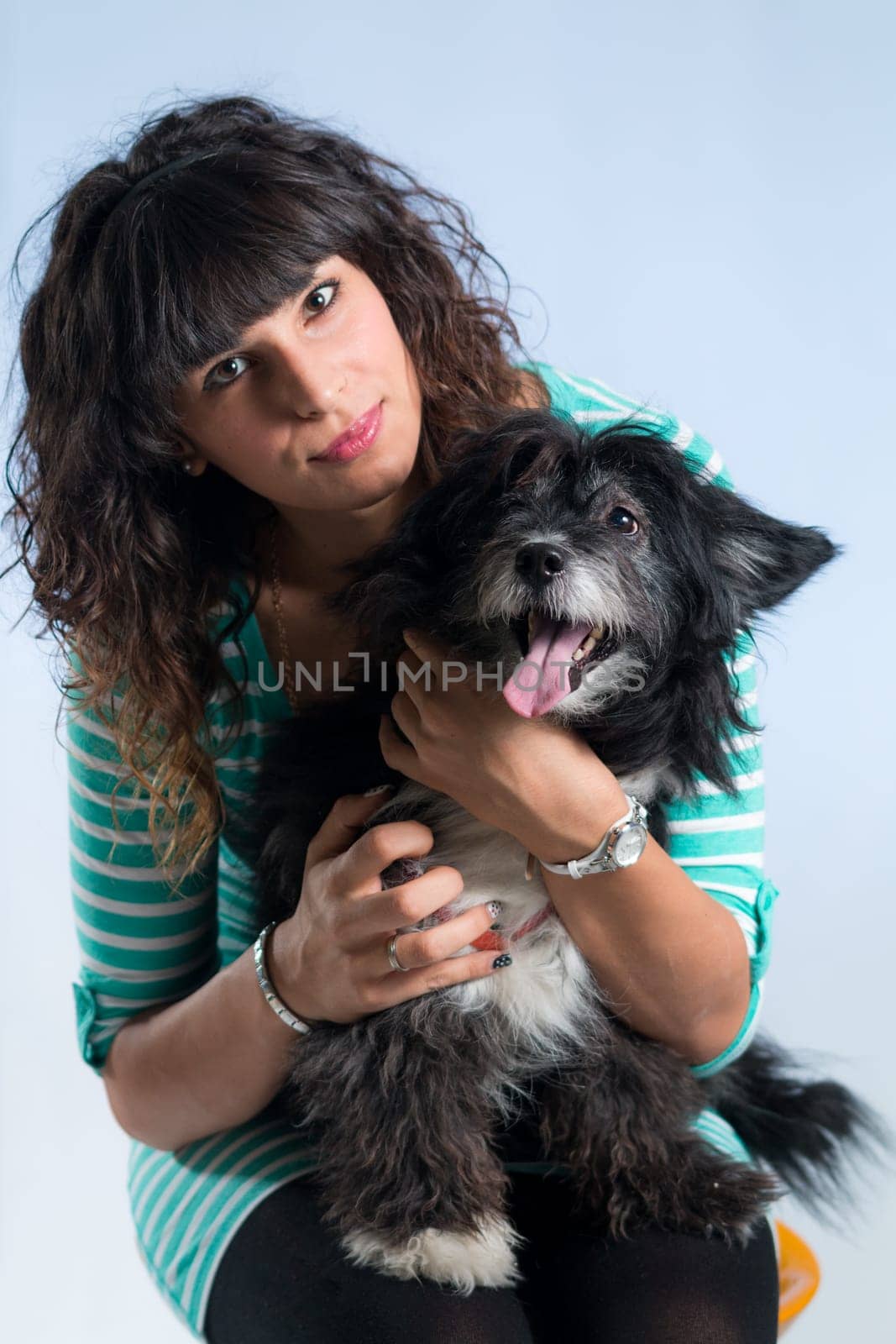woman posing with her dog