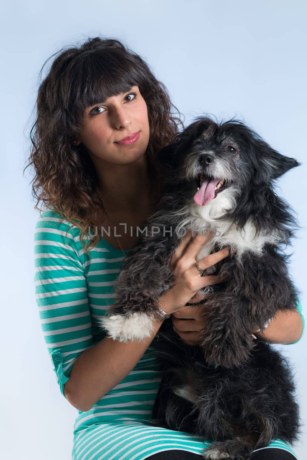 woman posing with her dog
