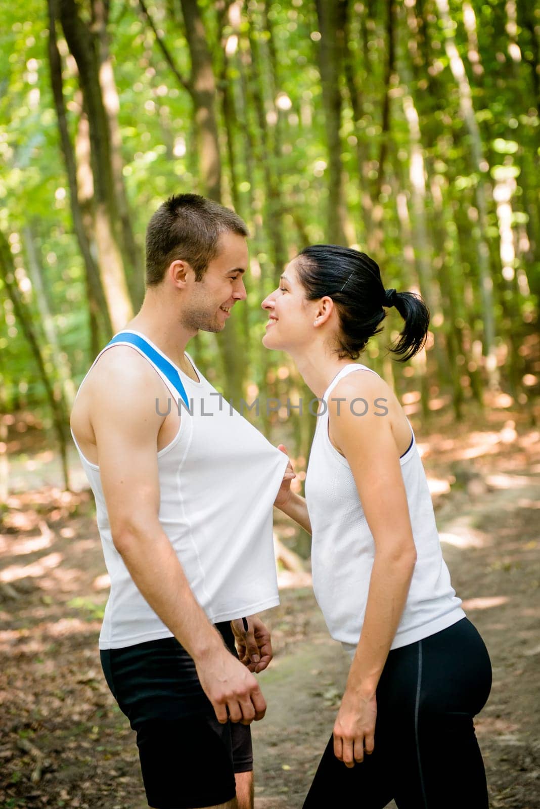 Sport couple together in nature having great time