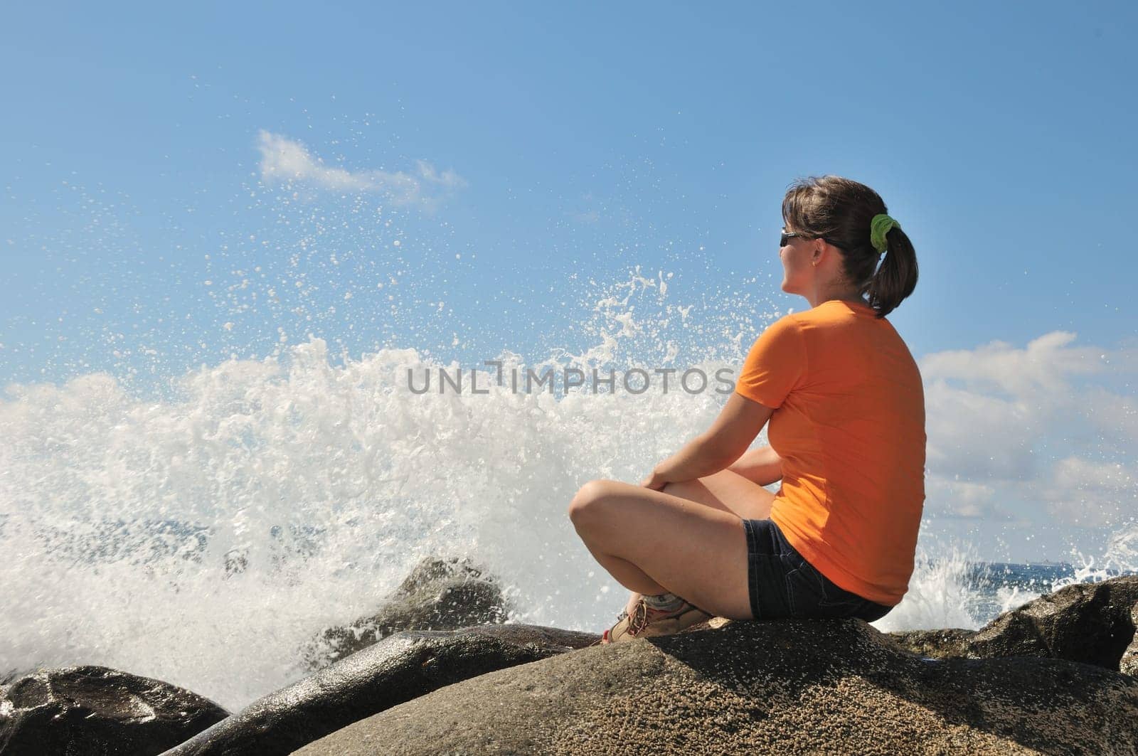 Young person relaxing and looking on sea view - vacation scene