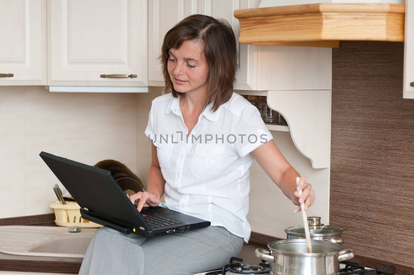 Multitasking - preparing meal and working